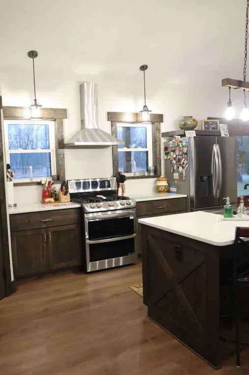 Alder kitchen island with an X-detail end panel — built by Amish Heritage Woodworks, Wisconsin