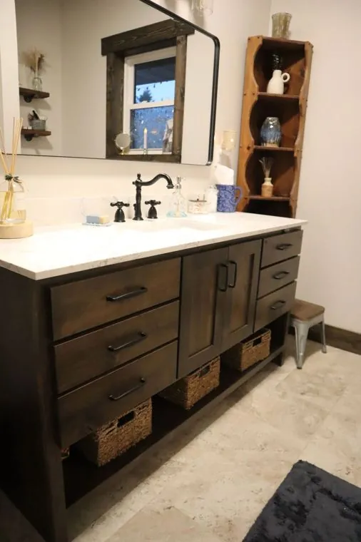 Single bathroom vanity with a quartz top and open lower shelf — built by Amish Heritage Woodworks, Wisconsin